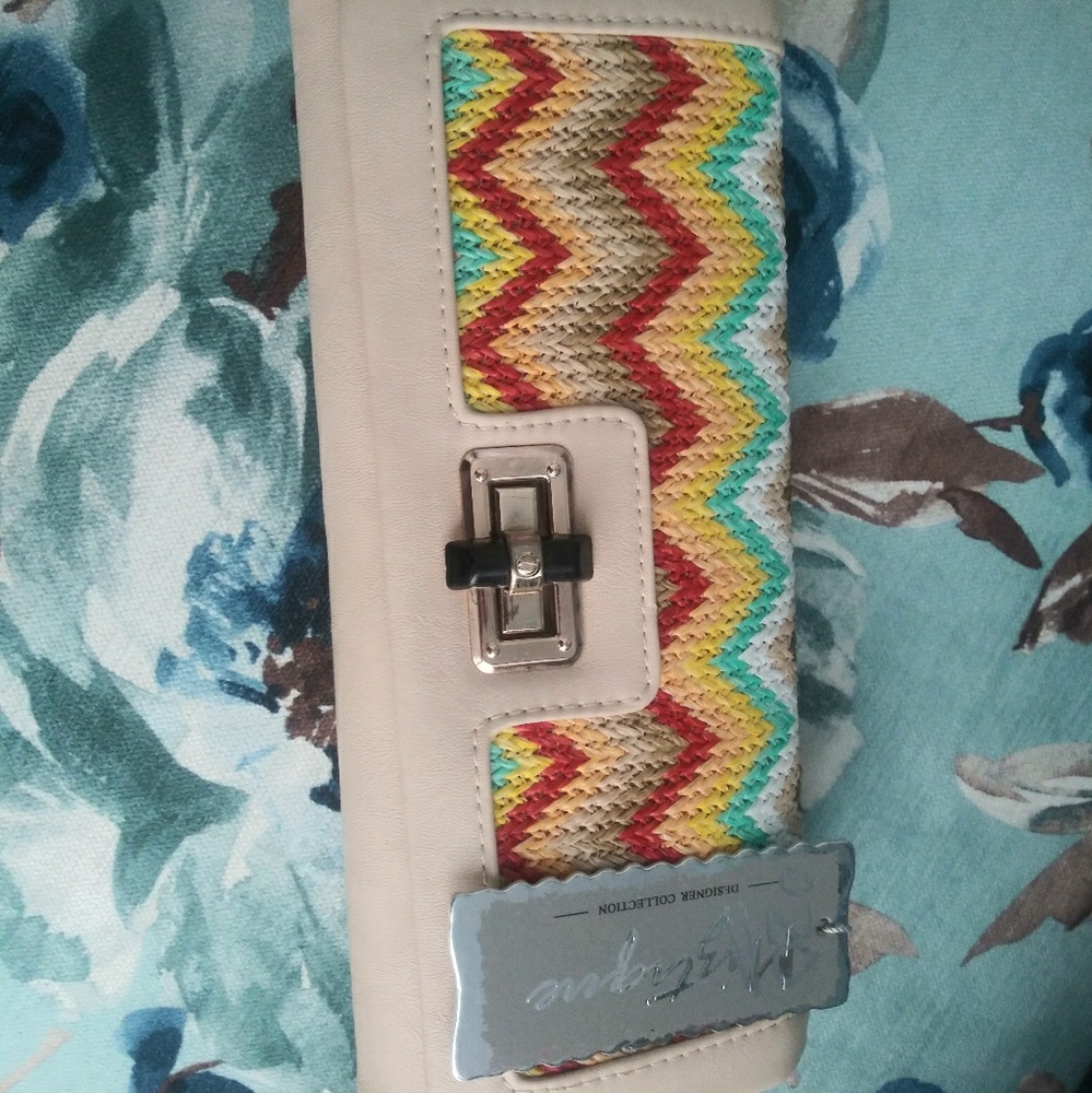 Ivory/ multi clutch brand new